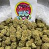 Rainbow Bezel is a vibrant hybrid cannabis strain with sweet, fruity flavors, uplifting effects, and relaxing body buzz, perfect Rainbow Bezel Cannabis Weed